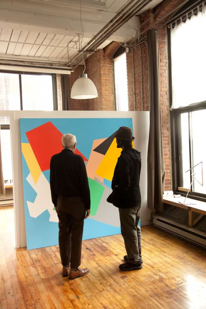 Marcel Barbeau et son petit-fils Manuel Barbeau-Lavalette dans l'atelier de la rue St-Ambroise.
